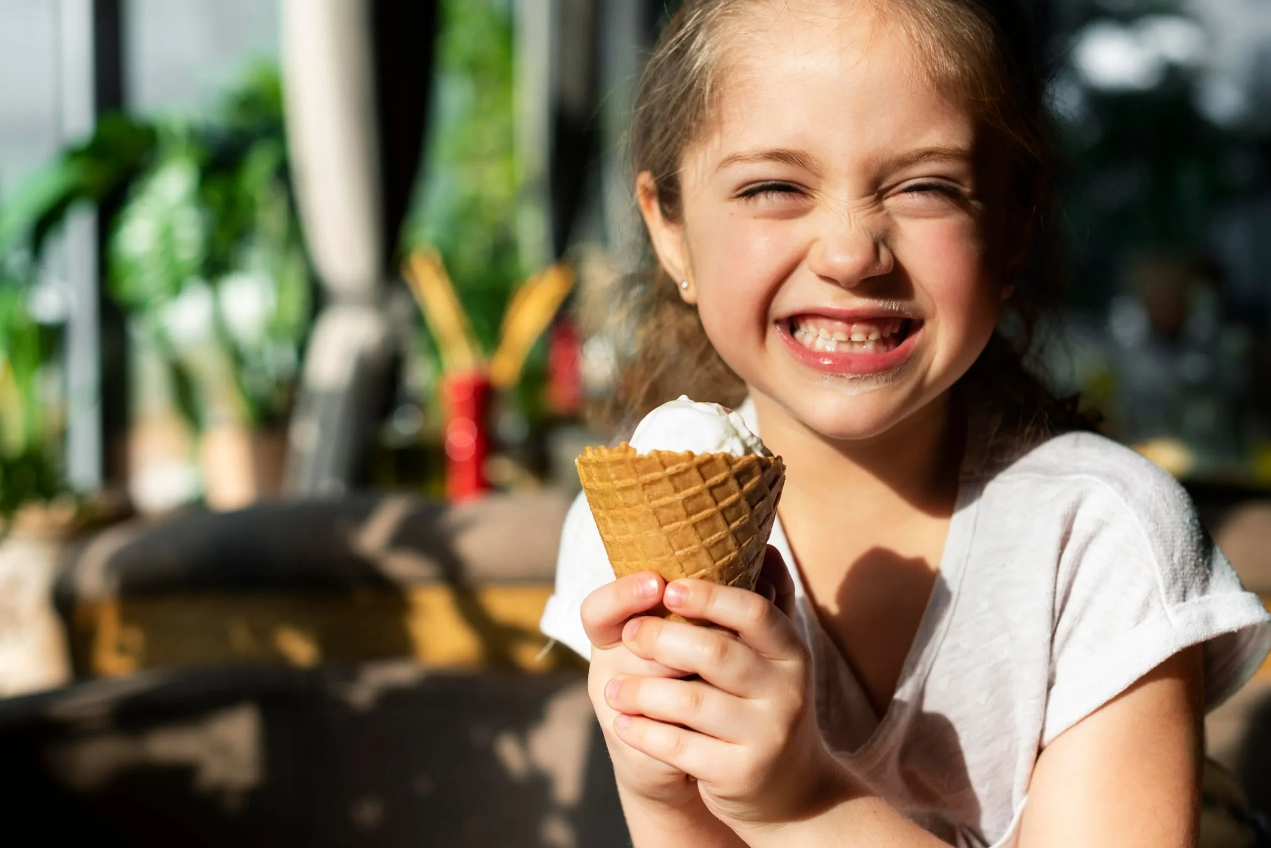 happy girl with ice cream for the kids catering - south of france resorts all inclusive - Country Kids